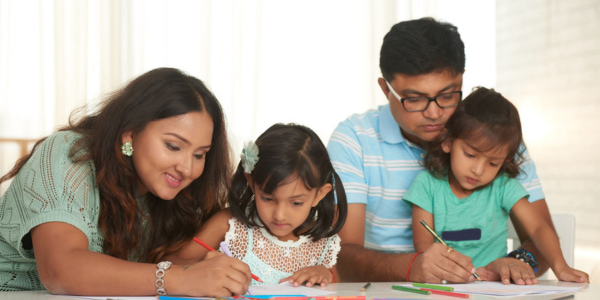 Family doing activity together, parents learn how to support their children via Parents Gateway